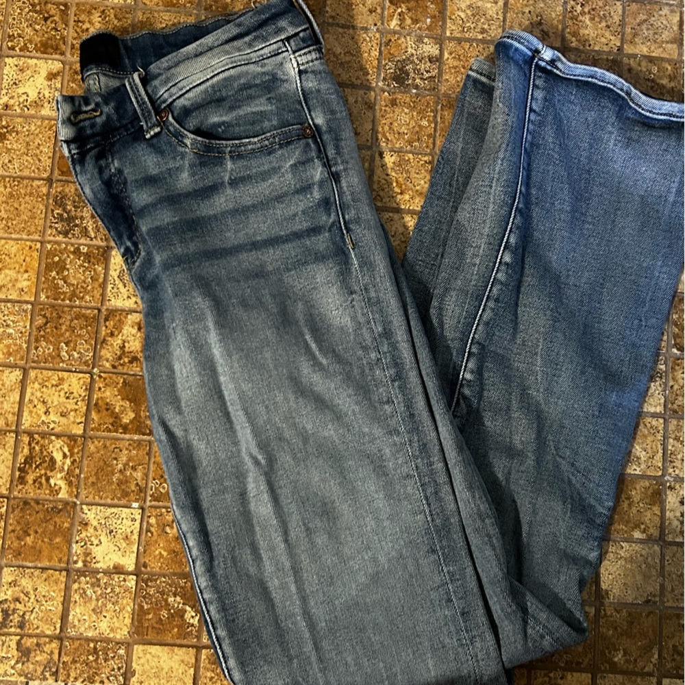 Buckle Black light wash denim jeans